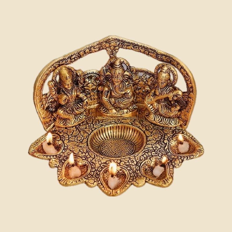 Laxmi Ganesh Saraswati with Diya Platter on a warm ivory background
