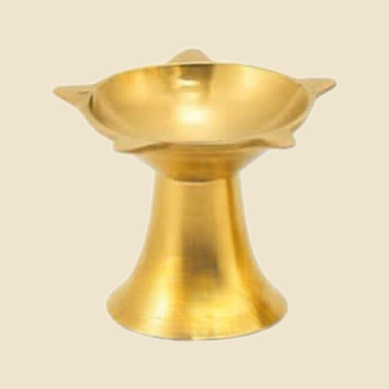 Star-Rim Brass Deepak, XL on a warm ivory background