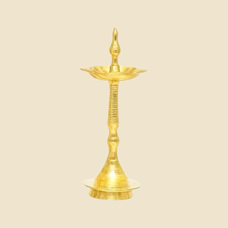 Kerala Nilavilakku Brass Lamp, XS on a warm ivory background