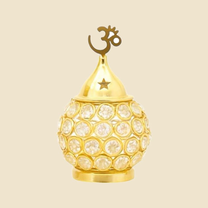 Crystal Matki Brass Akhand Diya, Medium on a warm ivory background
