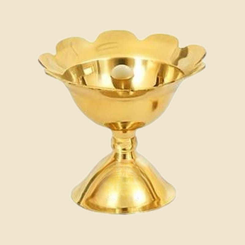 Devdas Brass Diya, Large on a warm ivory background