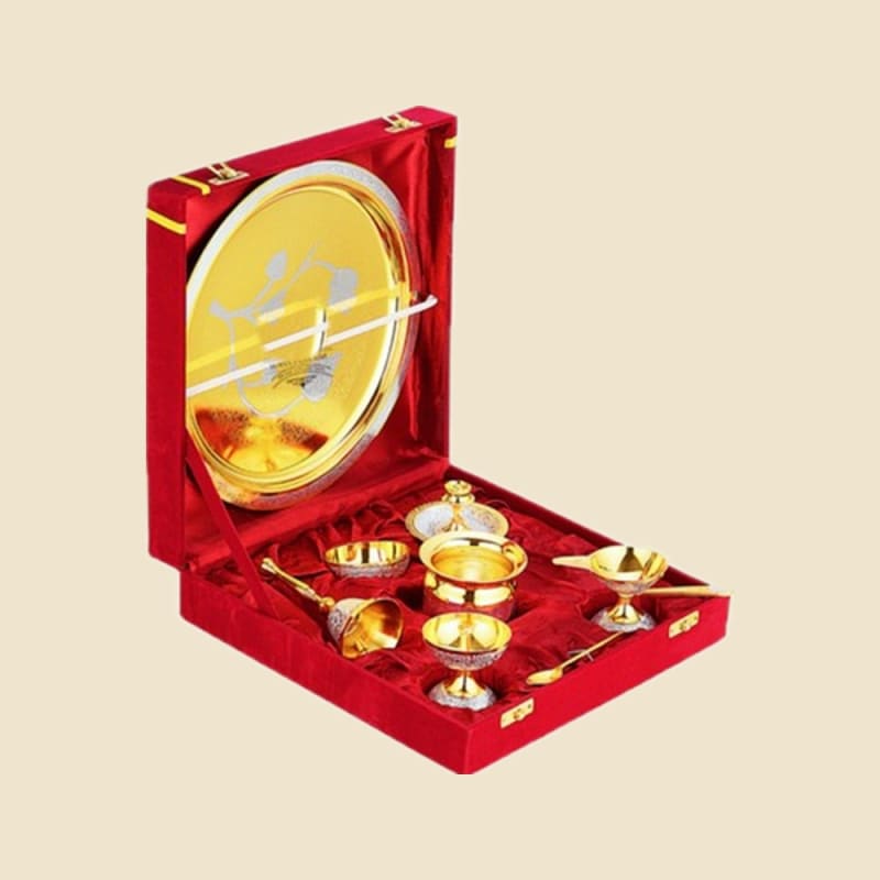 Two-Tone Brass Puja Set in Velvet Box on a warm ivory background
