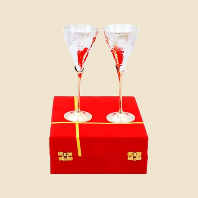 Silver-Finish Goblet Pair in Red Gift Box on a warm ivory background