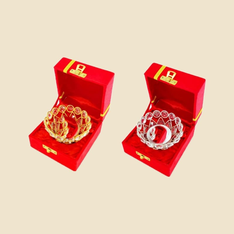 Crystal Katori in Gold and Silver Box on a warm ivory background