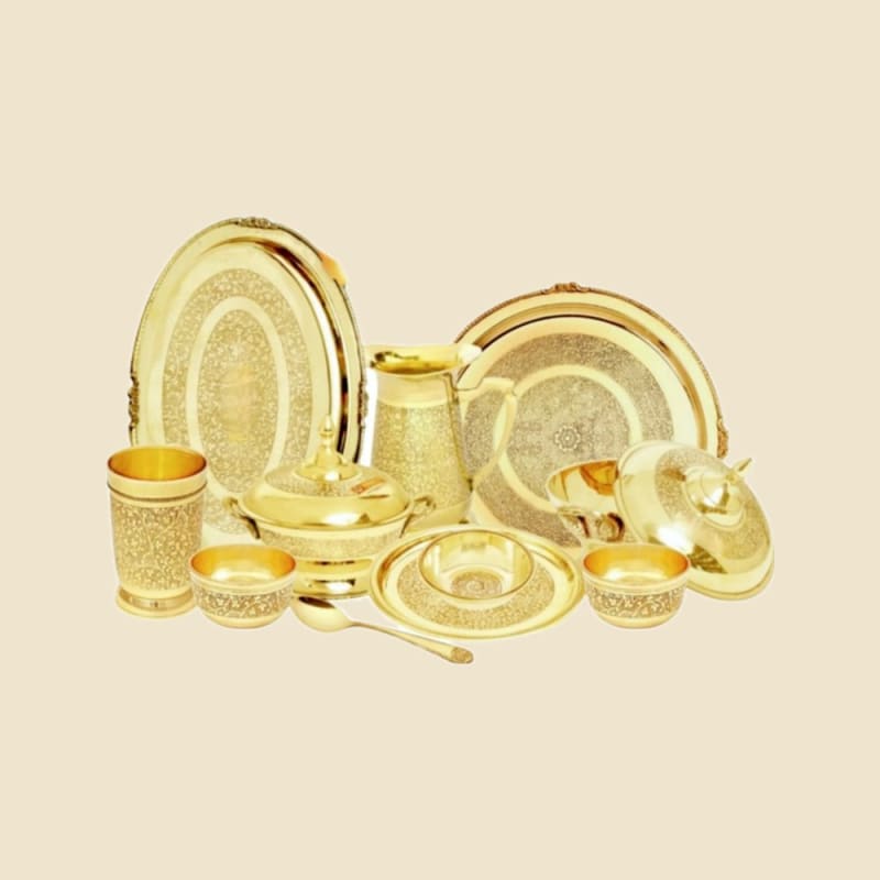 Etched Brass Dinner Set with Jug on a warm ivory background