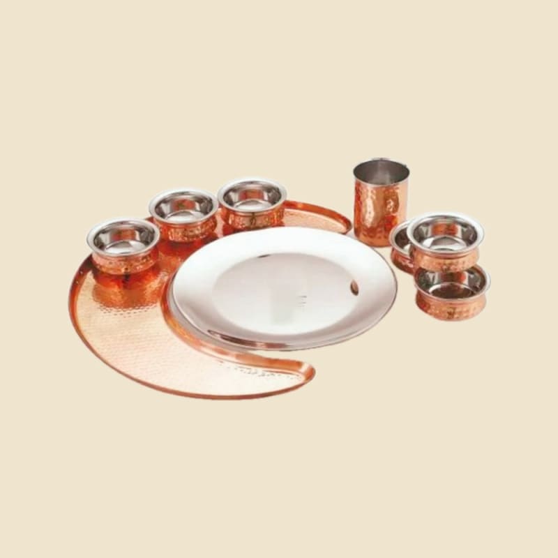 Steel and Hammered Copper Thali Set on a warm ivory background
