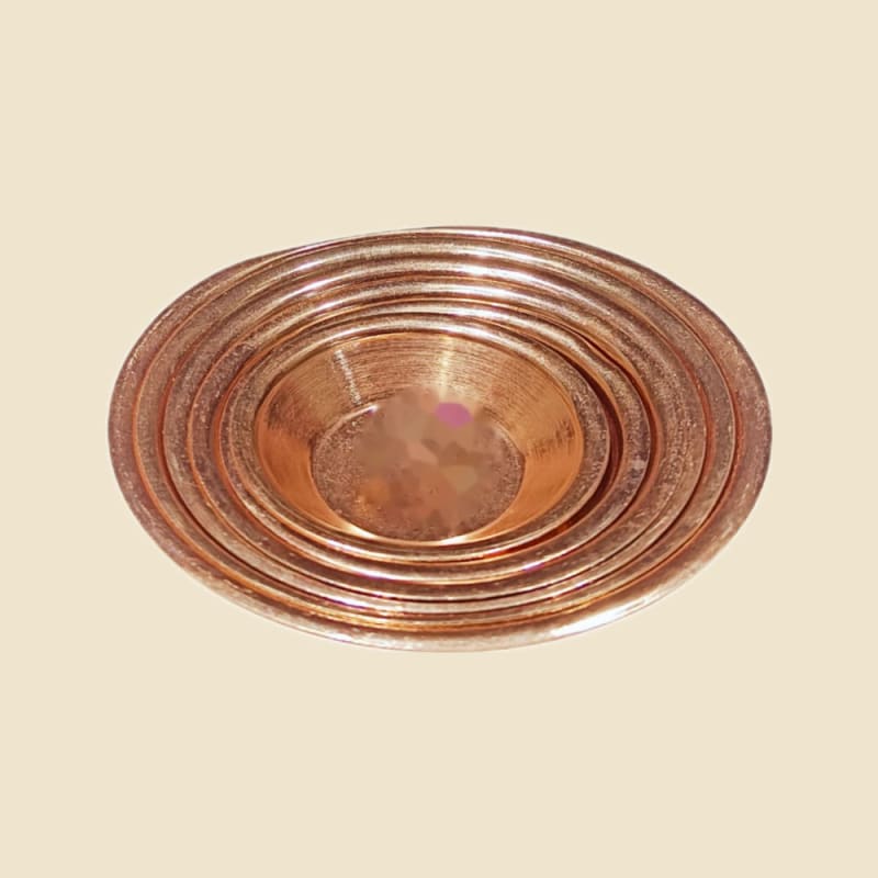 Copper Polish Tamni on a warm ivory background