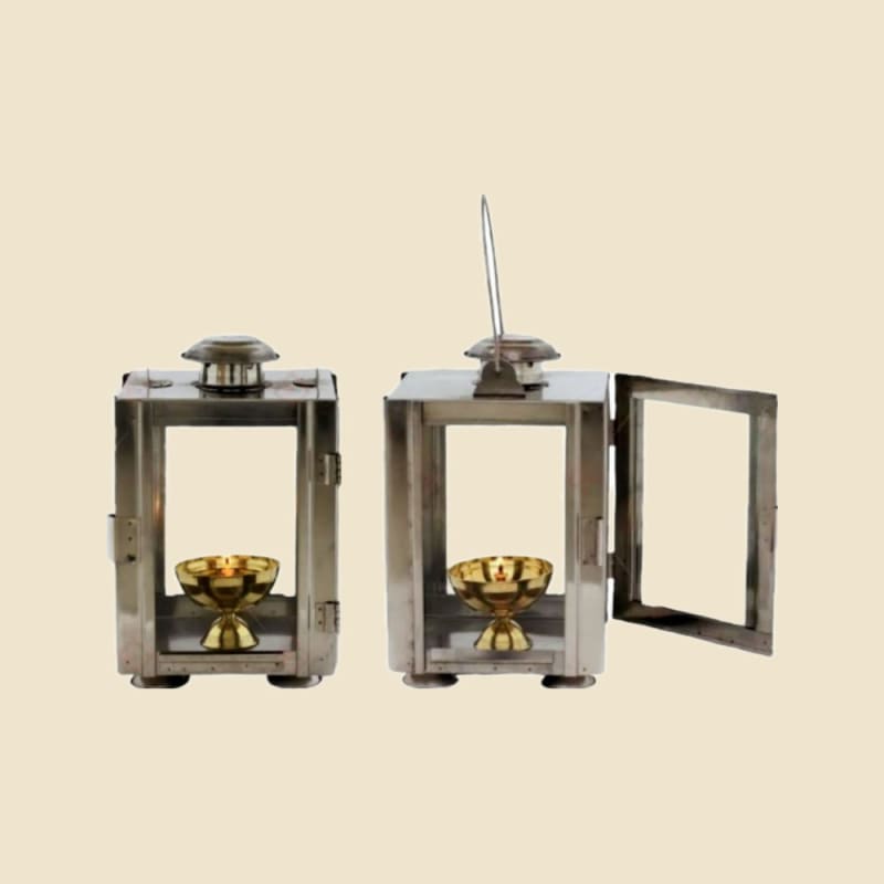 Steel Fanas (Lantern) with Glass on a warm ivory background