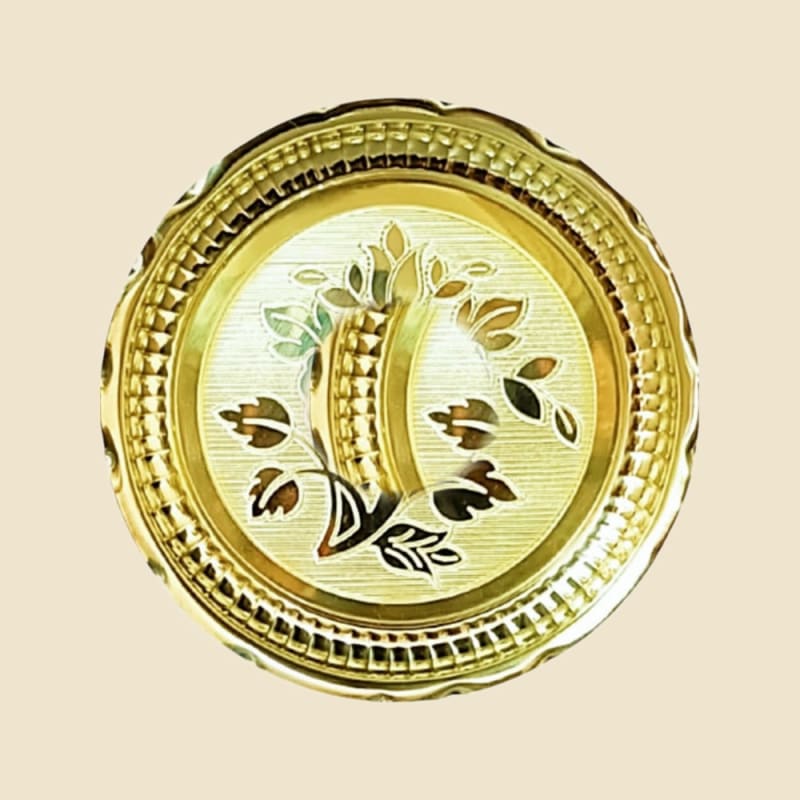Brass Aruna Plate (Design 2) on a warm ivory background