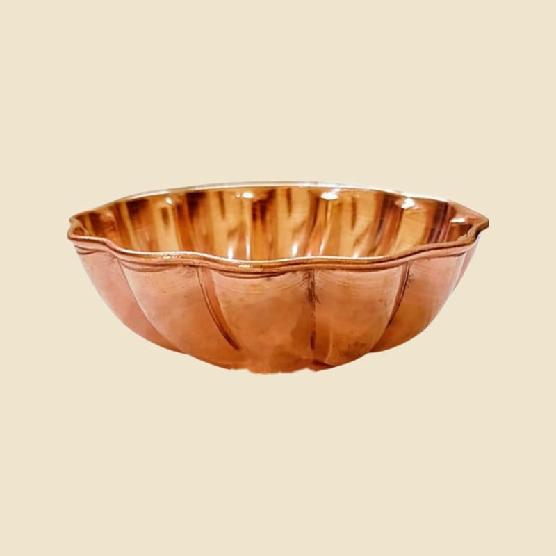 Copper Fancy Flower Vati on a warm ivory background