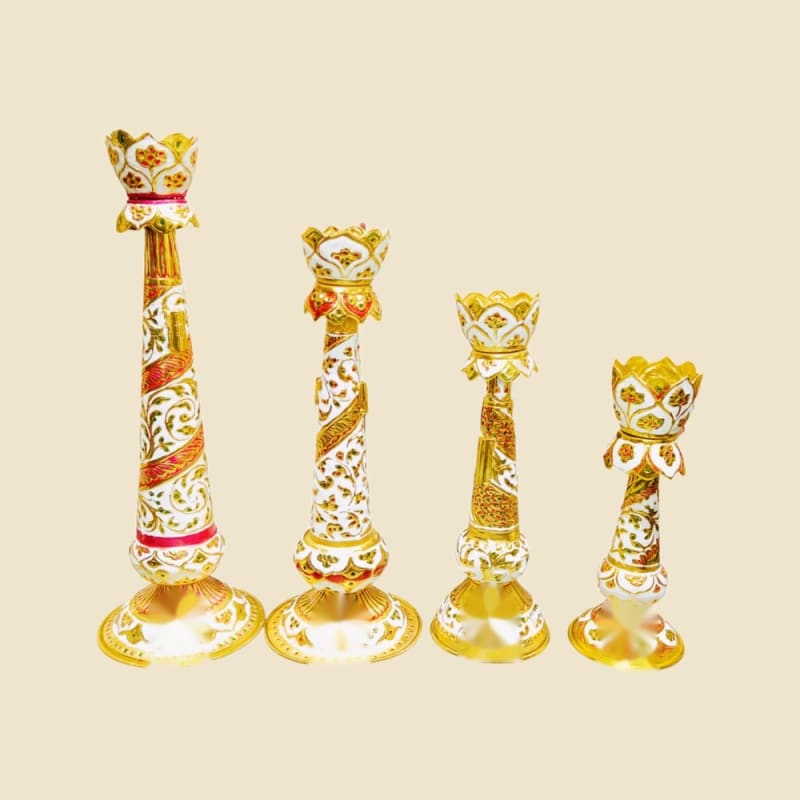 Brass Meena Kari Jyot Handle on a warm ivory background