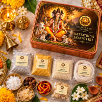 Close-up of Dattatreya items — vibhuti, sandalwood-jasmine dhoop