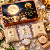 Close-up of lunar items — white sesame, rose water, mishri