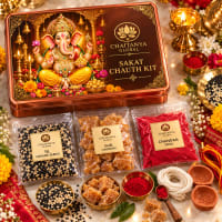 Close-up of til-gud offerings and hibiscus dhoop cones