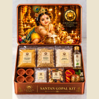 Open kit showing Tulsi Ark, Mantra Gutka and yellow cloth