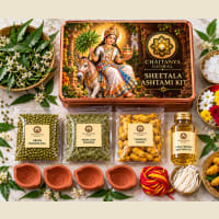 Open kit showing neem powder, mustard oil and unlit earthen diyas