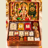 Open kit showing 16-knot Gowri Daara, pocket mirror and wooden comb