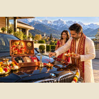 New car Vahan Pooja with coconut and kumkum tilak on bonnet