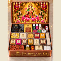 Open kit showing yellow cowries, brass coin and Shri Yantra photo