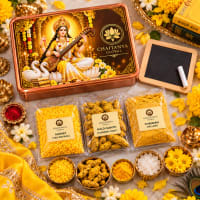 Close-up of yellow items — yellow wicks, marigold dhoop, yellow cloth