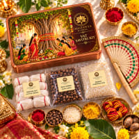 Close-up of Savitri items — kaccha sut, pankha, jasmine dhoop