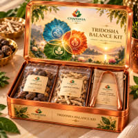 Open tin showing triphala, ashwagandha root and copper tongue scraper