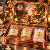 Open tin showing vetiver roots, loban resin tears and pure camphor pouches
