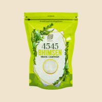 4545 Bhimsen Brass Camphor 200 g pouch on a warm ivory background