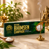 Bhimsen Camphor incense stick burning beside the box