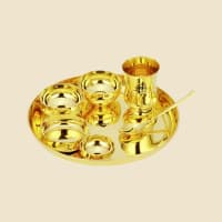 Brass Thali Set on a warm ivory background