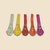 Laddu Gopal Embroidered Shringar Accessories on a warm ivory background