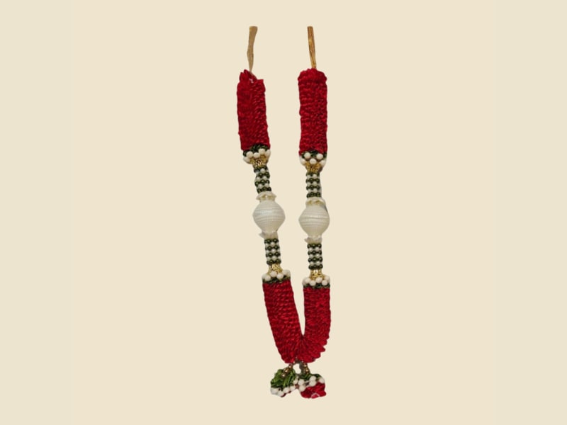 Red deity mala with white pearl-bead centrepiece
