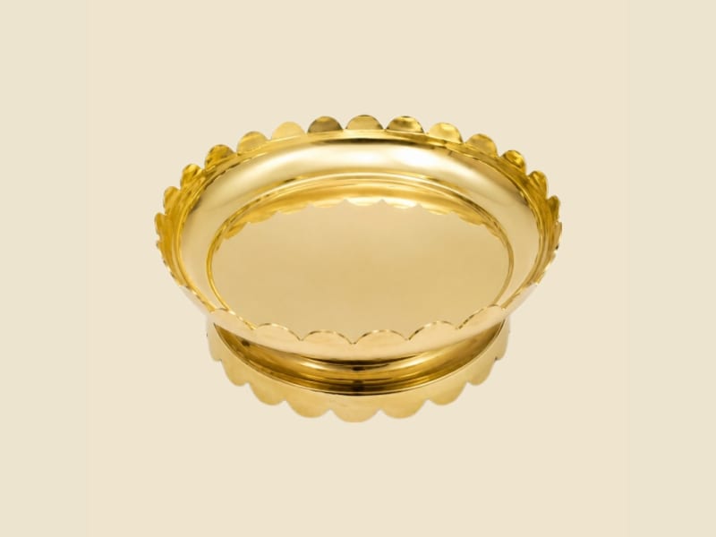 Brass Kamal Plate on a warm ivory background