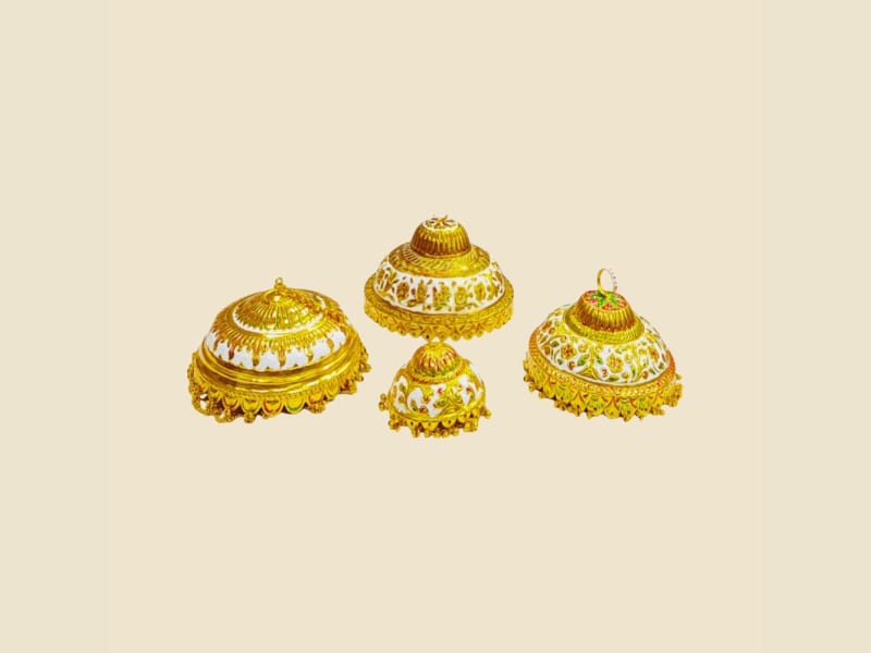 Meenakari Brass Chhatra on a warm ivory background