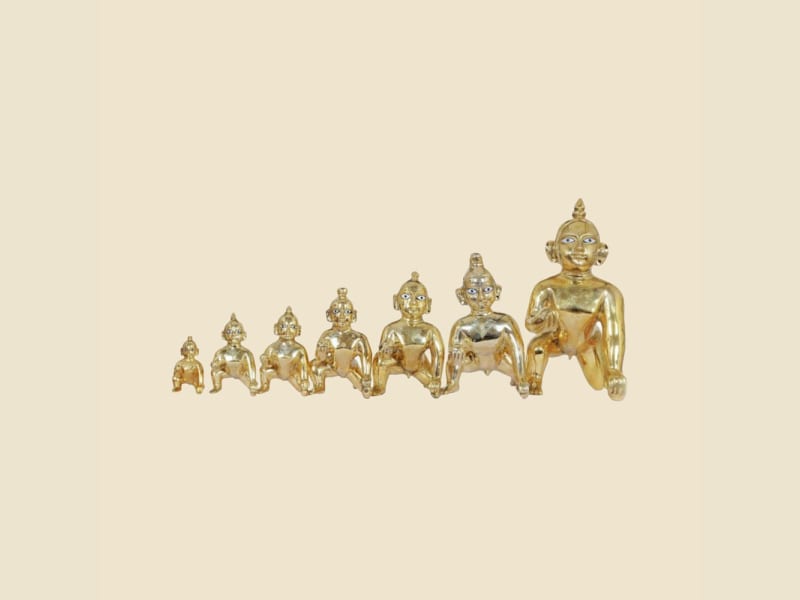 Laddu Gopal Size Range Set, 7 Sizes 4"-12" (10-30.5 cm) on a warm ivory background