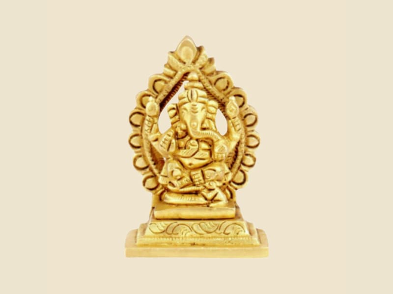 Brass Ganesha in Arch Frame on a warm ivory background
