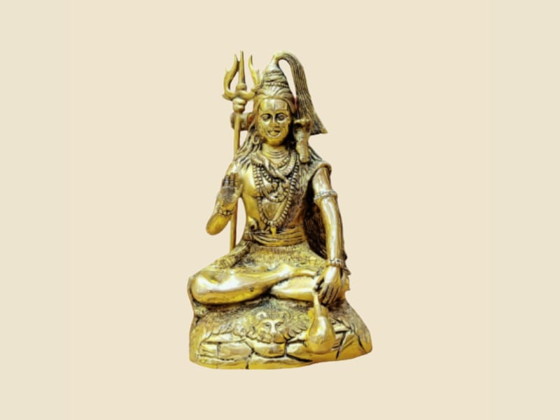 Brass Shiva Seated with Nandi on a warm ivory background