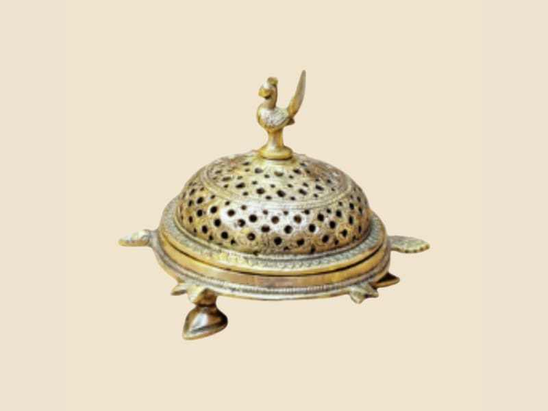 Brass Dome Incense Burner with Bird Finial on a warm ivory background