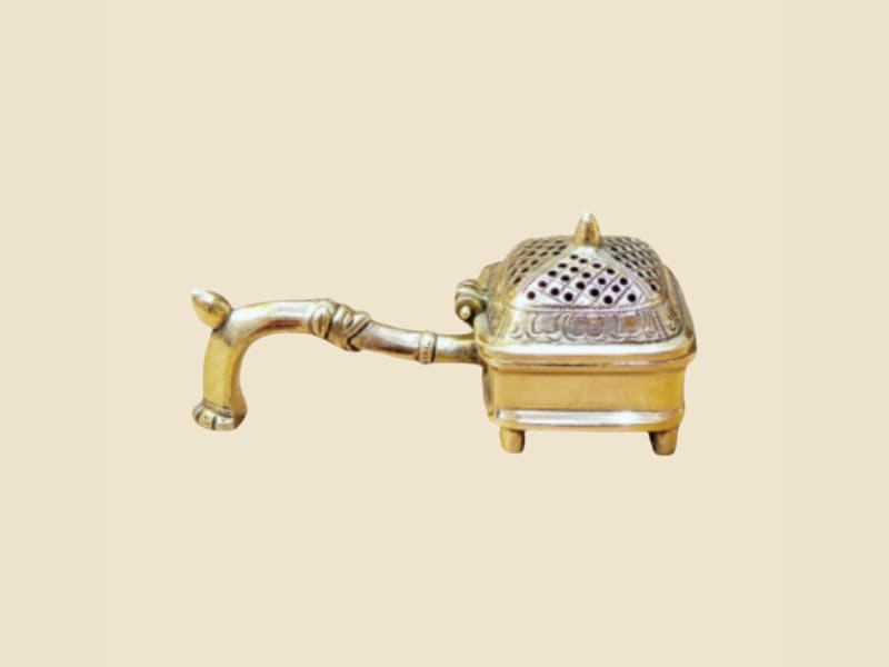 Brass Incense Burner Box with Handle on a warm ivory background