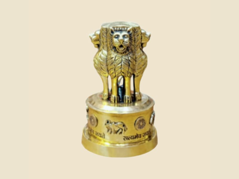 Brass Ashoka Pillar Lion Capital on a warm ivory background