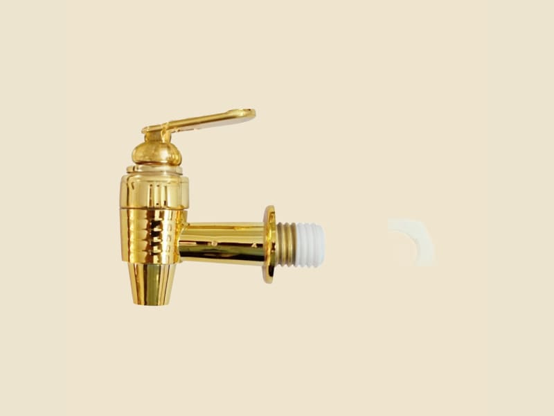 Plastic Dispenser Tap, Design 1 on a warm ivory background