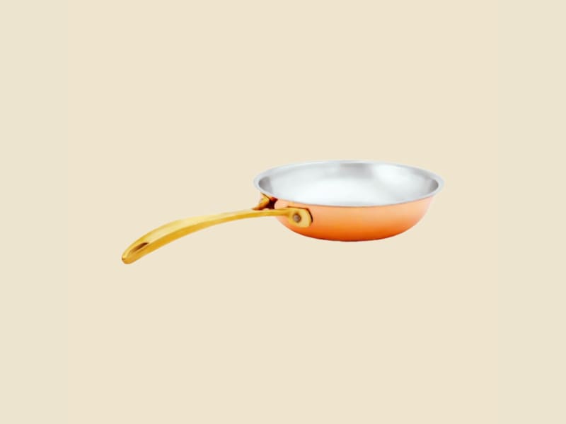 Copper Fry Pan on a warm ivory background