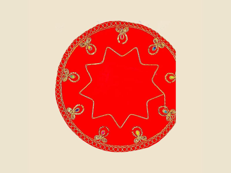 Round Puja Aasan, Red (CI 1176) on a warm ivory background