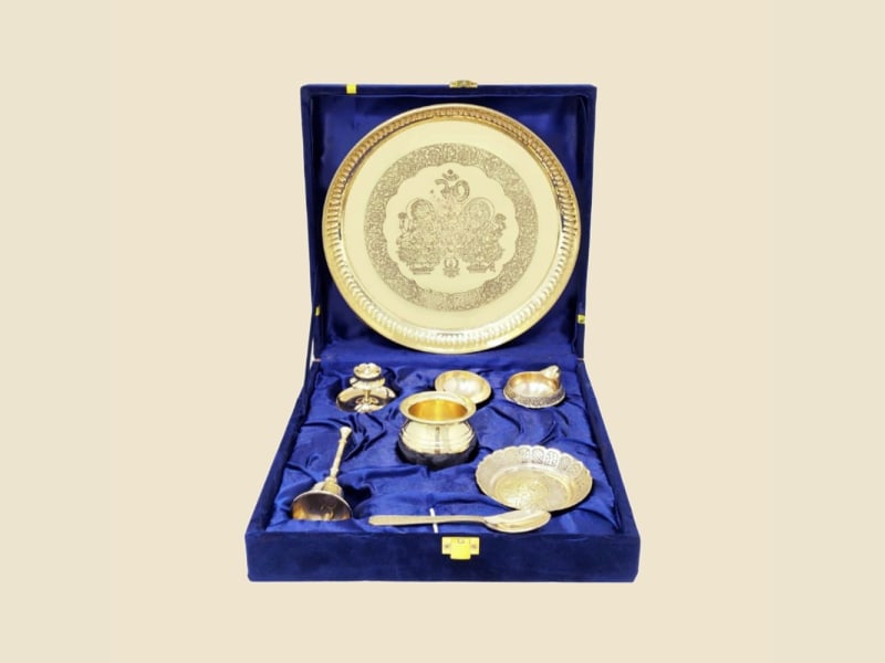 Laxmi-Ganesh Brass Puja Gift Set in Blue Box on a warm ivory background