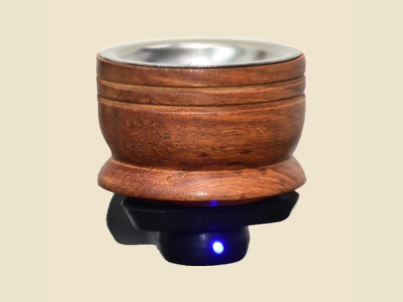 Wooden Electric Aroma Burner on a warm ivory background
