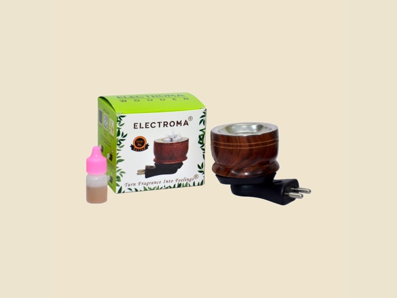 Electroma Electric Dhoop and Oil Burner on a warm ivory background