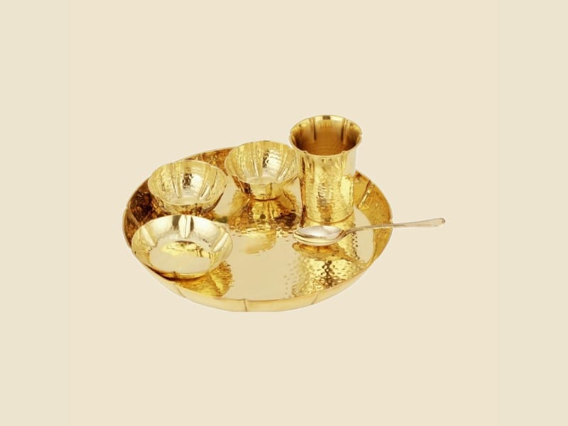 Brass Thali Set with Etched Glass on a warm ivory background