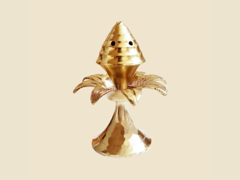 Brass Agardan Khajur on a warm ivory background