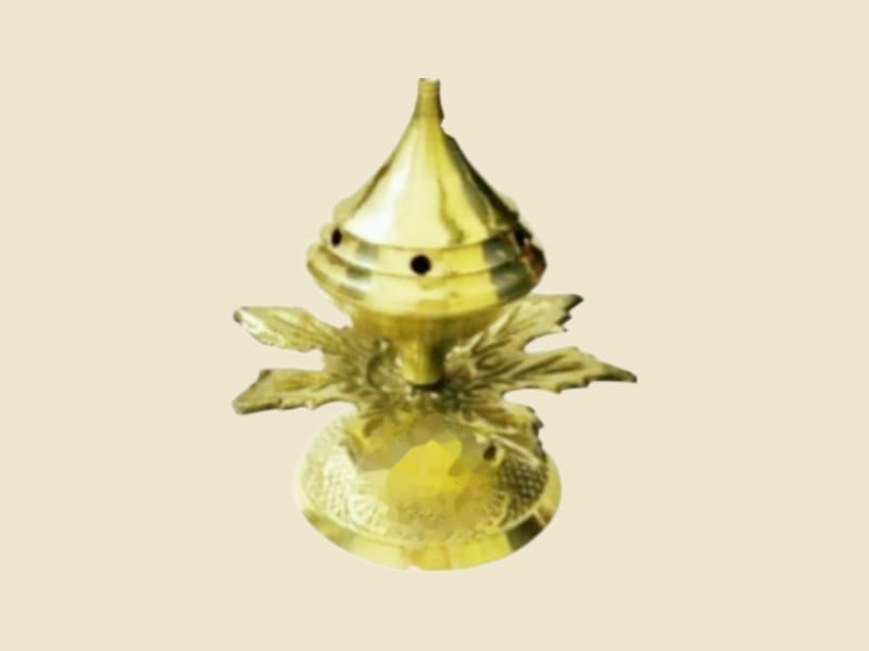 Brass Neem Agardan on a warm ivory background