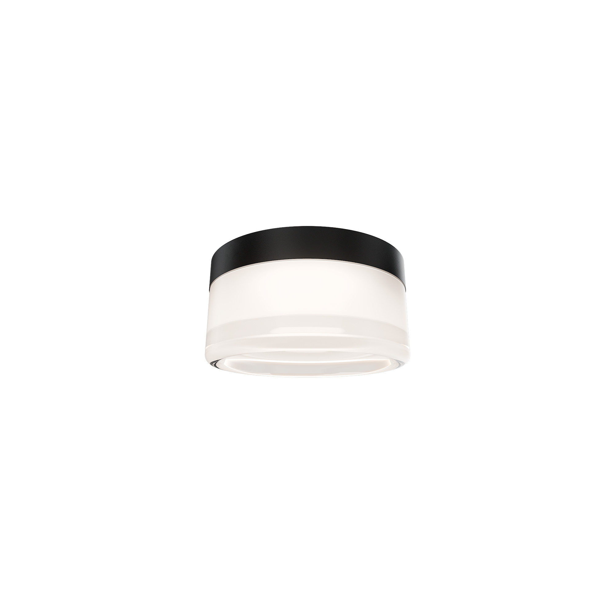 Minimal Form. Maximum Versatility. The Tuck II Outdoor LED Flush Mount proves that simplicity and sophistication can coexist beautifully. Defined by its clean circular profile and diffuser featuring a banded ring design, Tuck II emits a soft, even glow that enhances exterior spaces with ambient illumination. Engineered for durability, this versatile fixture is wet rated for outdoor use, making it ideal for everything from patios and porches. Compact yet powerful, Tuck is equipped with 4CCT selectable color temperature, giving you the flexibility to fine-tune the light for every setting, from warm, relaxing ambiance to bright, functional illumination. Its minimalist design blends effortlessly with modern architecture while providing reliable, high-performance lighting that’s built to last. Available in a heat resistant option for sauna application, making it ideal for everything from patios and porches to wellness spaces and spa environments.